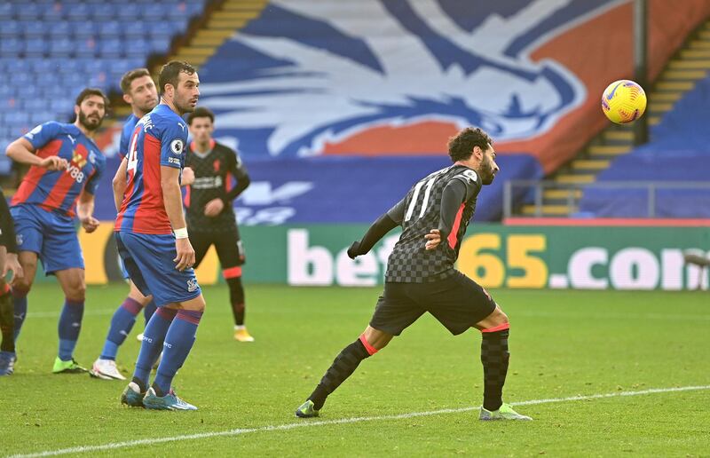 LONDON, ENGLAND - DECEMBER 19:  Mohamed Salah of Liverpool scores his team's sixth goal during the Premier League match between Crystal Palace and Liverpool at Selhurst Park on December 19, 2020 in London, England. The match will be played without fans, behind closed doors as a Covid-19 precaution. (Photo by Justin Setterfield/Getty Images)