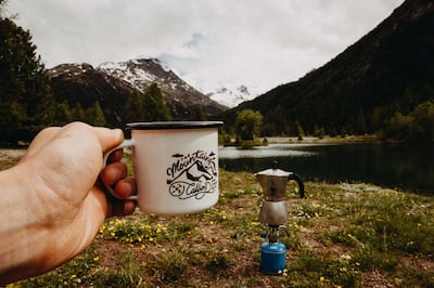 A camping stove, water carrier and cool box are some other must-haves experts recommend investing in. Photo: Kevin Schmid / Unsplash