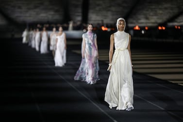 epa09281964 A handout photo made available by the Presidency of the Hellenic Republic shows models performing during a show by French fashion powerhouse Christian Dior at Panathenaic Stadium (Kallimarmaro) in Athens, Greece, 17 June 2021. (issued 18 June 2021). The Panathenaic Stadium or Kallimarmaro became the hosting facility for a show by legendary fashion house Dior. The 2022 Cruise Collection is based on creations by Dior art director Maria Grazia Chiuri, and it also includes references to the bicentennial of Greece's Revolution of Independence and ancient Greek culture in its selection of white and blue fabrics and background stage decor. EPA/THEODORE MANOLOPOULOS HANDOUT HANDOUT EDITORIAL USE ONLY/NO SALES