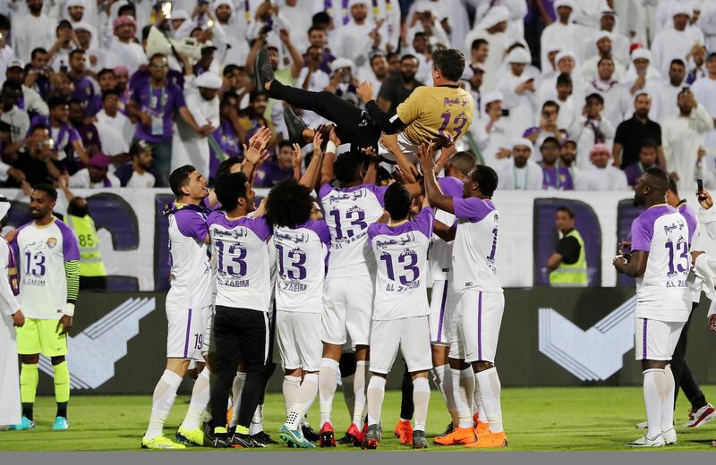 DUBAI , UNITED ARAB EMIRATES , APRIL 21 - 2018 :- Team members of Al Ain celebrating with their coach Zoran Mamic and supporters after beating  Al Nasr by 4-0 in the Arabian Gulf League football match between Al Ain vs Al Nasr held at Shabab Al Ahli Dubai Stadium at Al Aweer in Dubai. ( Pawan Singh / The National ) For Sports. Story by John