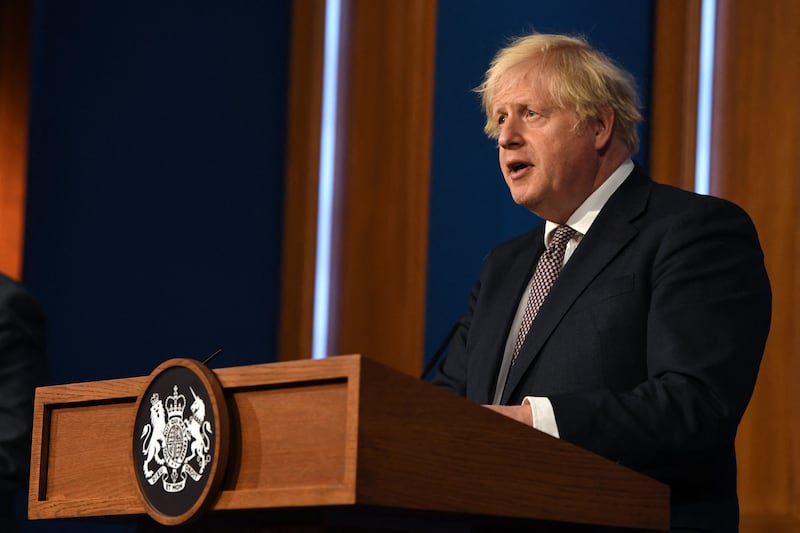 Britain's Prime Minister Boris Johnson gives an update on relaxing restrictions imposed on England at a virtual press conference from No 10 Downing Street, London. AFP