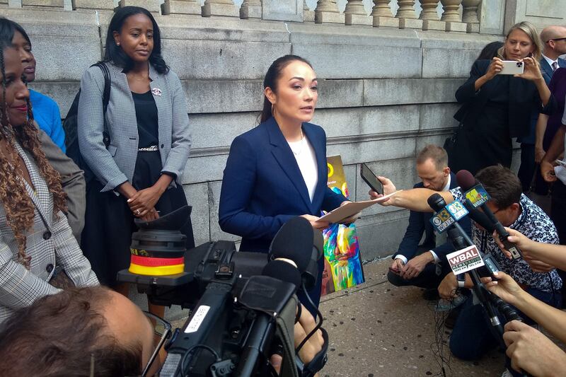 Erica Suter, director of the Innocence Project Clinic at the University of Baltimore School of Law and Mr Syed's lawyer, speaks outside the courthouse. AFP