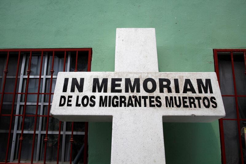 FILE PHOTO: A memorial cross for people who have died crossing the border is seen at Casa del Migrante in Reynosa, Mexico April 1, 2013.   REUTERS/Eric Thayer/File Photo