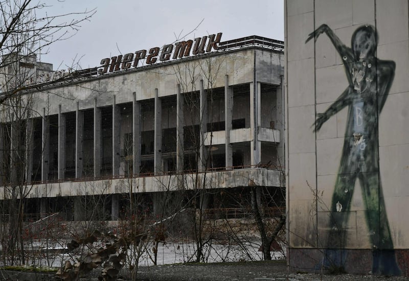 Graffiti on a building wall on the central square of the ghost town of Pripyat, not far from Chernobyl nuclear power plant.  AFP