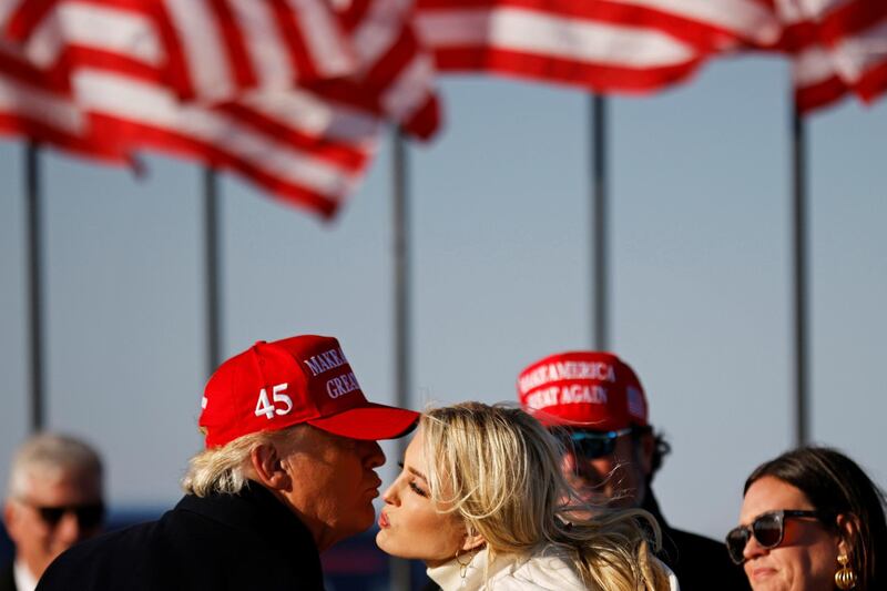 US President Donald Trump kisses his daughter Ivanka at the end of a campaign rally at Dubuque Regional Airport in Dubuque, Iowa, US. Reuters
