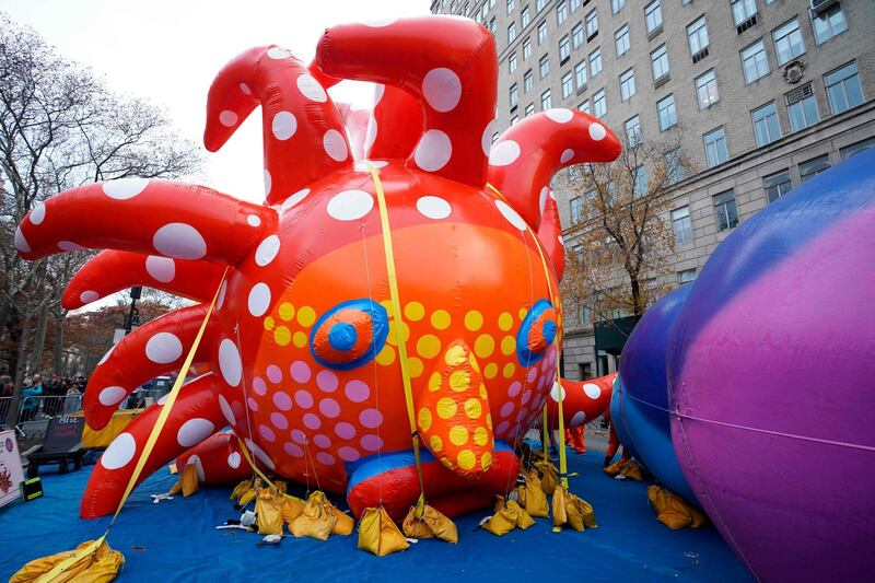 Yayoi Kusama is the first ever female artist commissioned by the Blue Sky Gallery program to create a balloon for Macy's Thanksgiving Parade.  AFP / TIMOTHY A. CLARY