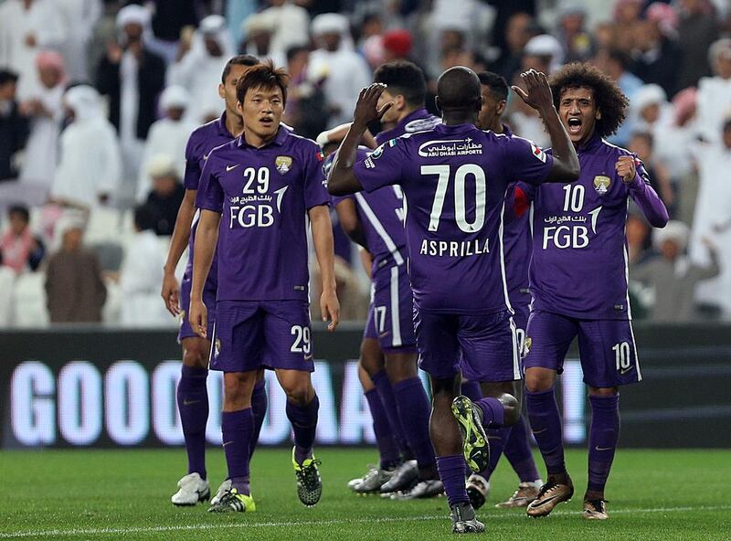 Al AIN celebrates after scoring the goal during the Arabian Gulf League match between Al Ain and Al Wasl at the Hazza Bin Zayed Stadium in Al Ain . Satish Kumar / The National