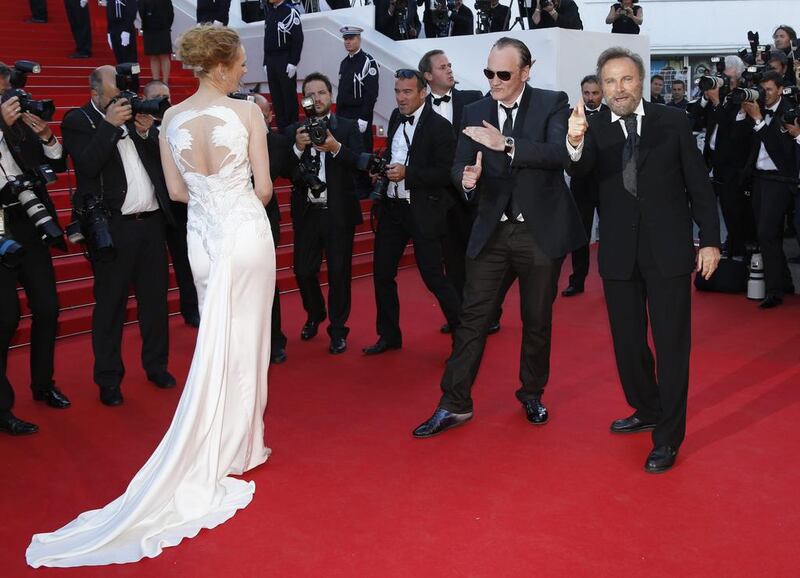 Uma Thurman, Quentin Tarantino on the red carpet as they arrive for the screening of Per un pugno di dollari (A Fistful of Dollars) EPA 