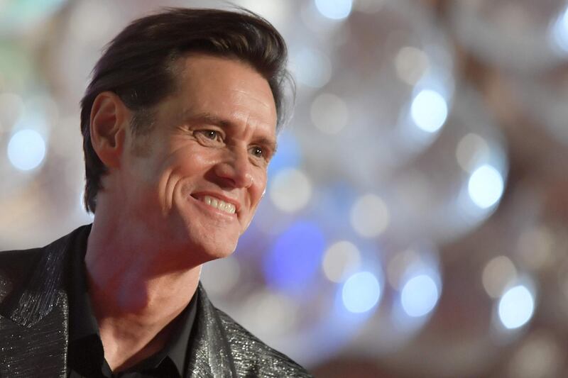 (FILES) In this file photo taken on September 5, 2017 actor Jim Carrey attends the photocall of the movie "Jim & Andy: The Great Beyond - The Story Of Jim Carey & Andy Kaufman With A Very Special, Contractually Obligated Mention Of Tony Clifton" presented out of competition at the 74th Venice Film Festival at Venice Lido. 
Veteran comic actor Jim Carrey has been spared the prospect of civil trial over the suicide of his girlfriend Cathriona White, his representative said on February 1, 2018, after the case was dismissed. White's estranged husband Mark Burton and mother Brigid Sweetman had filed a wrongful death lawsuit against the star following her overdose in September 2015, accusing him of procuring drugs under a bogus name for her.They also alleged that the 56-year-old actor -- known for a string of hit comedy movies including "The Mask," "Liar Liar" and "Ace Ventura: Pet Detective" -- had given White three sexually-transmitted diseases.
 / AFP PHOTO / Tiziana FABI