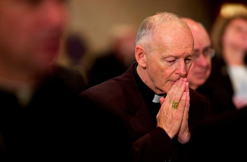 (FILES) In this file photo taken on November 11, 2002, Archbishop of Washington Cardinal Theodore McCarrick prays during a prayer for deceased bishops at the start of the morning session of the US Conference of Catholic Bishops being held in Washington, DC.  Pope Francis has accepted the resignation of Cardinal  McCarrick, who is accused of sexually abusing a teenager nearly five decades ago, the Vatican said on July 28, 2018. McCarrick, the former archbishop of Washington, was removed from the ministry in June after a review board found there was "credible" evidence that he had assaulted the teen while working as a priest in New York in the early 1970s.
 / AFP / SHAWN THEW
