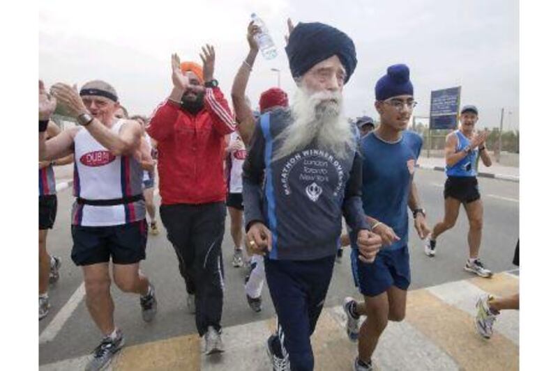 The 100-year-old runner Fauja Singh is an 'inspiration' for young and old, a reader says. Jaime Puebla /The National