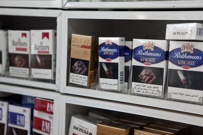 Abu Dhabi, United Arab Emirates, December 26, 2012: 
Various brands of cigarettes sit on display, all featuring a graphic image meant to deter smokers, in a small corner store in Abu Dhabi on Wednesday, Dec. 26, 2012.  Silvia Razgova/The National



