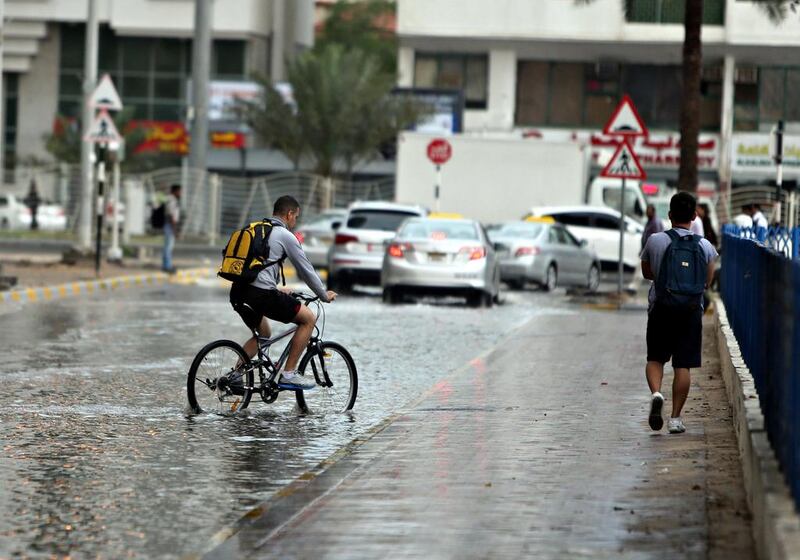 Heavy rain swept over Abu Dhabi Thursday morning as commuters went to work and school. Sammy Dallal / The National 



