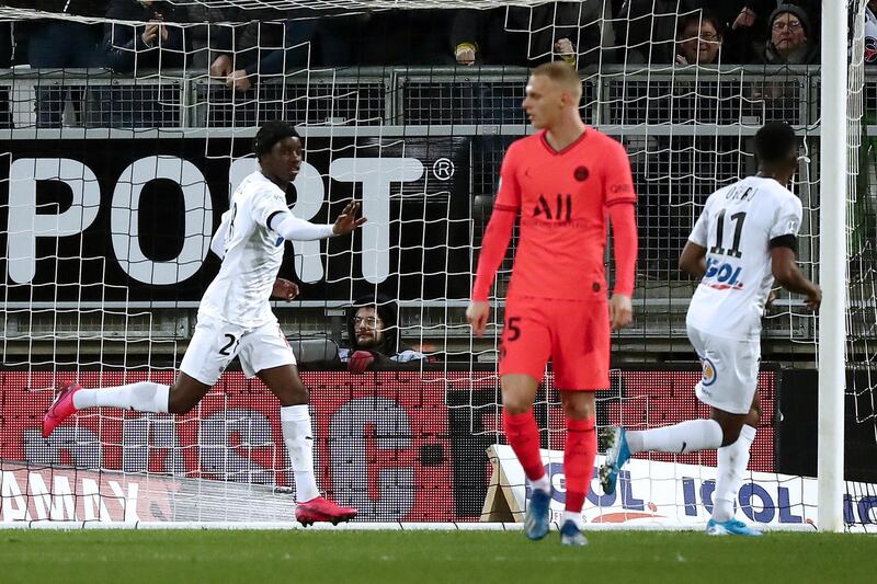 Fousseni Diabate (L) of Amiens celebrates scoring the third.  EPA