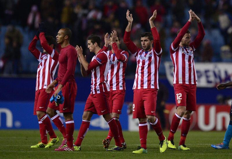 Atletico Madrid 2-0 Porto. The red-hot La Liga side ended group play without a defeat, simultaneously dealing the Portugese club elimination and saving Russian side Zenit Saint Petersburg. Javier Soriano / AFP