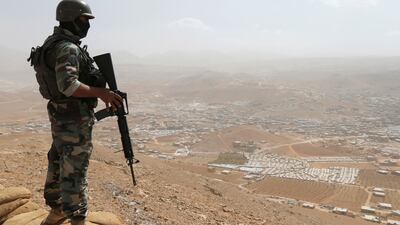 A Lebanese soldier at an army post in the hills above the Lebanese town of Arsal, near the border with Syria. Reuters