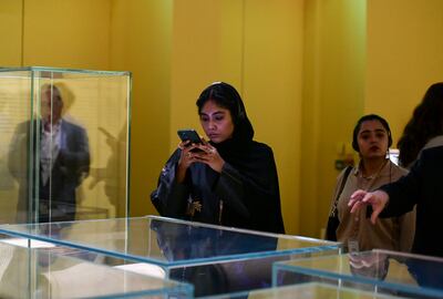 A visitor takes in the Letters of Light exhibition at Louvre Abu Dhabi. Any novelty value once attached to the idea of a Muslim nation valuing important heritage from the Christian and Jewish traditions is long gone. Khushnum Bhandari / The National 
