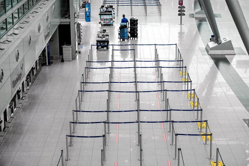 A view of the deserted check-in area of the International Airport in Duesseldorf, Germany. Concerned about a new and more contagious strain of the coronavirus, the German government plans to ban all passenger flights to Germany. EPA