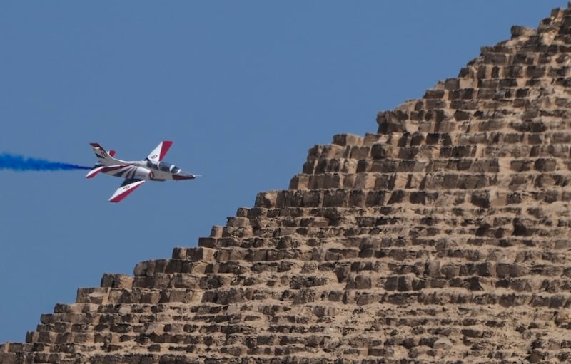 Flying behind a pyramid.