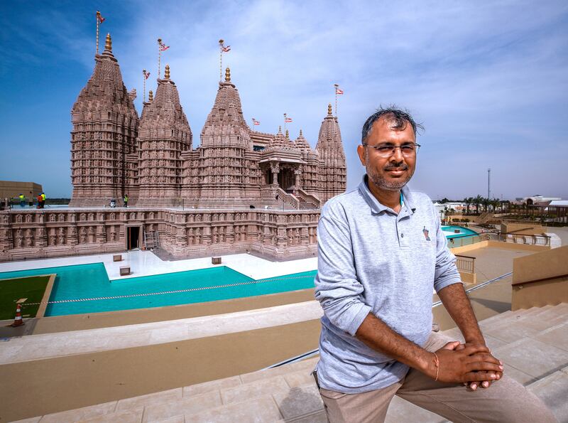 Mr Raval on the ghats, or steps, that overlook the temple to evoke the feeling of sitting on a riverbank in India. Victor Besa / The National