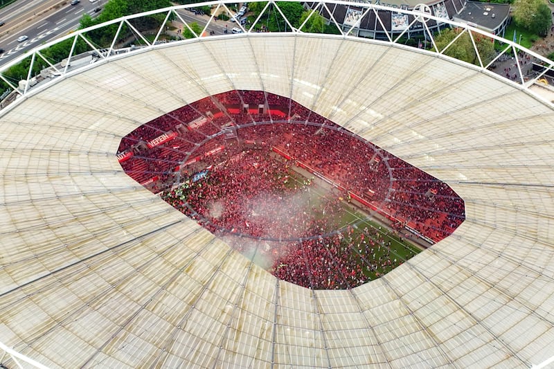 Aerial view of the BayArena as Leverkusen fans run on to the pitch. AP