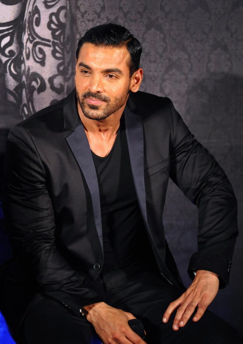 Indian Bollywood actor John Abraham attends the trailer launch of upcoming Hindi film ‘Welcome Back’ in Mumbai late on July 6, 2015.   AFP PHOTO (Photo by STR / AFP)