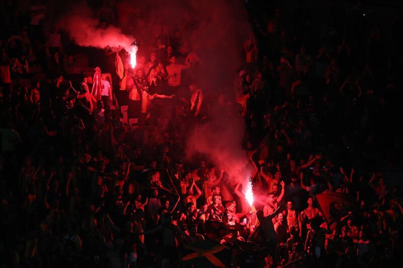 ES Tunis fans light flares during the match. Getty Images