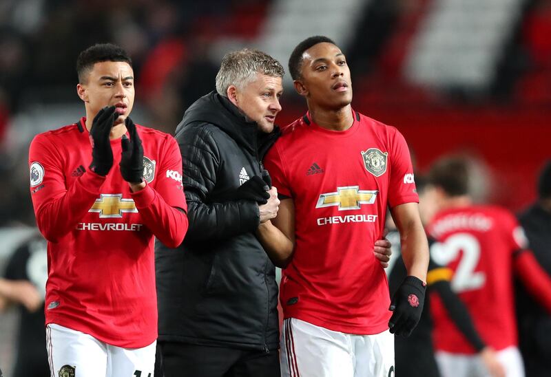 Manchester United manager Ole Gunnar Solskjaer speaks to Anthony Martial. Getty