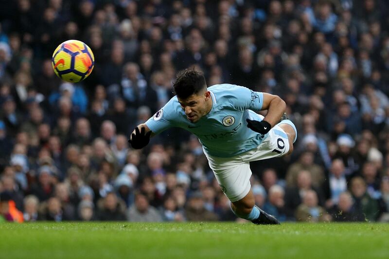 MANCHESTER, ENGLAND - DECEMBER 23: Sergio Aguero of Manchester City scores his sides first goal during the Premier League match between Manchester City and AFC Bournemouth at Etihad Stadium on December 23, 2017 in Manchester, England.  (Photo by Matthew Lewis/Getty Images)