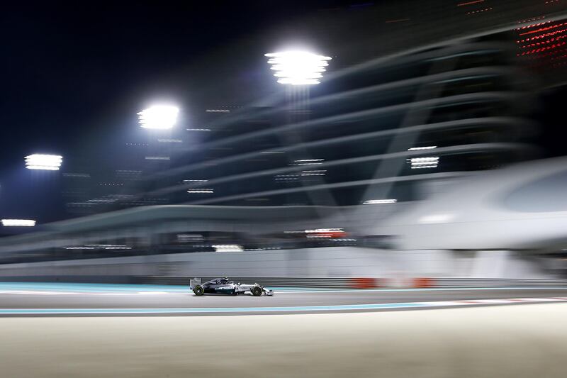 Abu Dhabi, United Arab Emirates, November 23, 2014:     Mercedes driver Lewis Hamilton races to victory and the championship during the Formula One Etihad Airways Grand Prix at the Yas Marina Circuit in Abu Dhabi on November 23, 2014. Christopher Pike / The National

Reporter:  N/A
Section: Sport
Keywords: 

