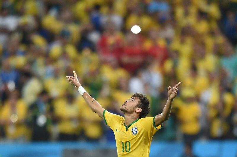 Neymar reacts after scoring on Thursday in Brazil's World Cup opening win over Croatia in Sao Paulo, Brazil. Vanderlei Almeida / AFP
