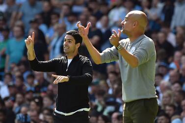 Arsenal's manager Mikel Arteta, left, and Manchester City's head coach Pep Guardiola gesture during the English Premier League soccer match between Manchester City and Arsenal at Etihad stadium in Manchester, England, Saturday, Aug.  28, 2021.  (AP Photo / Rui Vieira)