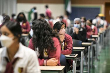 Abu Dhabi, United Arab Emirates - Pupils seated for the Mathematic, grade 11 exam hall at Gems Cambridge International School in Baniyas. Khushnum Bhandari for The National