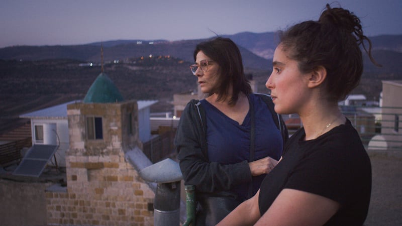 Hiam Abbass, left, and her daughter Lina Soualem in Deir Hanna. Photo: Beall Productions