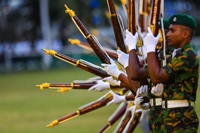 Commandos perform during the 156th Sri Lanka Police Day celebrations in Colombo. AFP