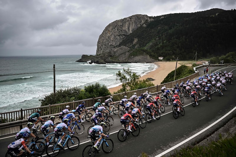 The peleton riding at the Bay of Biscay. AFP
