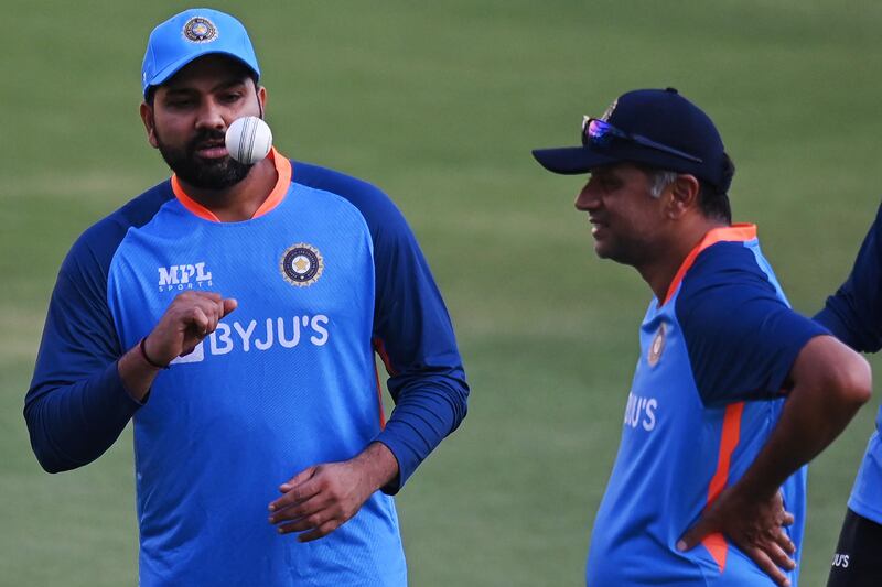 India captain Rohit Sharma with coach Rahul Dravid during a practice session on the eve of the first T20 against South Africa at the Greenfield International Stadium in Thiruvananthapuram on Tuesday, September 27, 2022. AFP