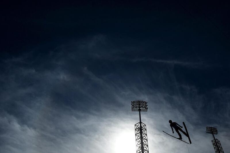 An athlete competes during ski competitions at the RusSki Gorki Ski Jumping Center on Wednesday. Julian Finney / Getty Images