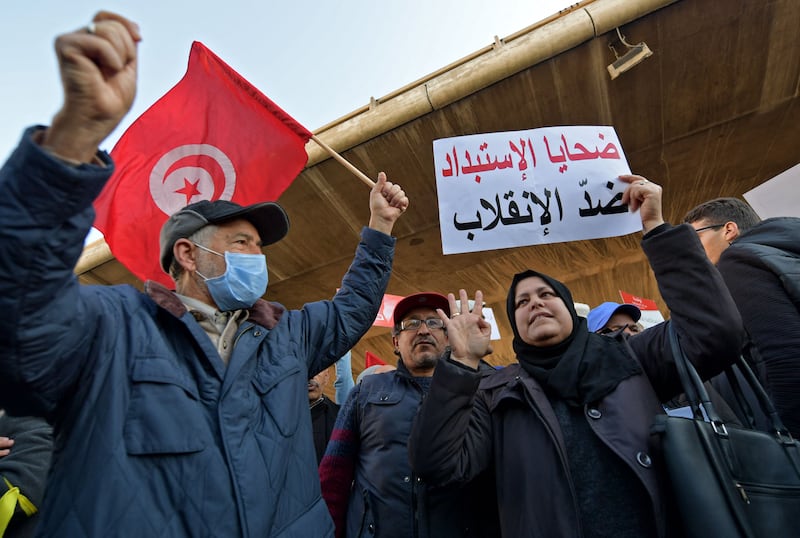 Opponents of Tunisian President Kais Saied slam his decision to extend the suspension of parliament. AFP