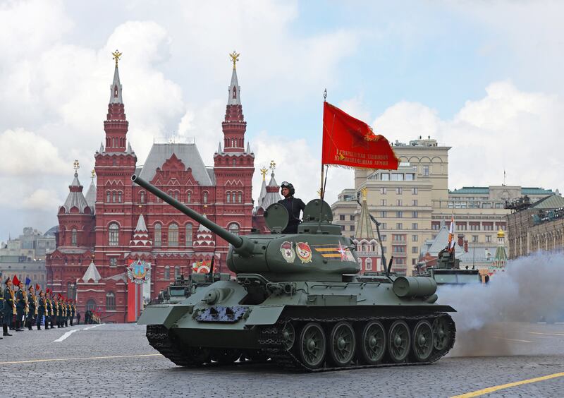 A T-34 Soviet-era tank powers along in Red Square. Reuters