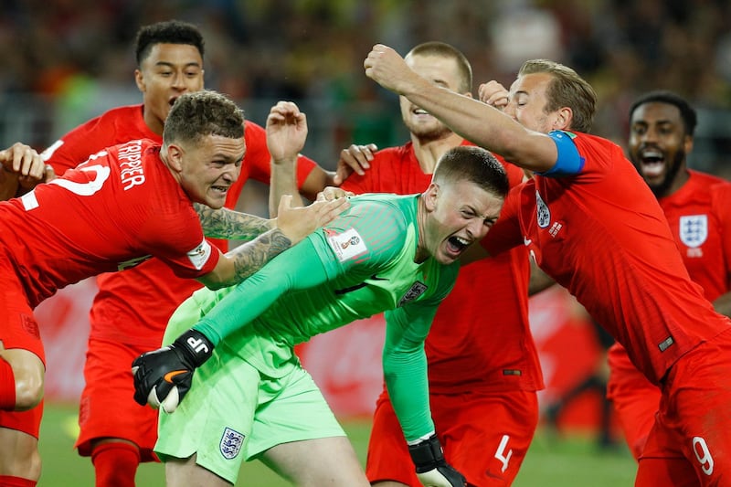 England celebrate their win - it is the first time in history that England have been successful in a World Cup penalty shoot out. Victor R. Caivano / AP Photo