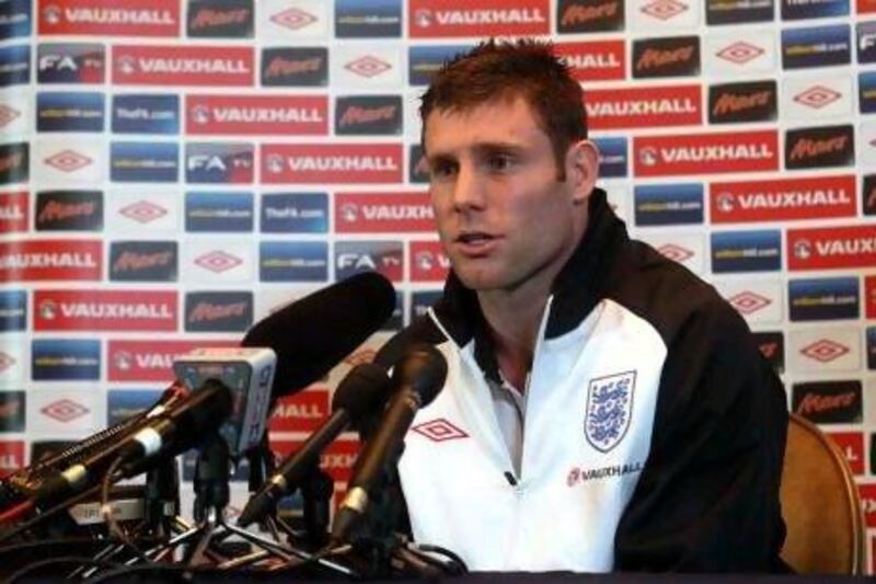 James Milner, above, says caretaker manager Stuart Pearce can handle the pressure of coaching England.