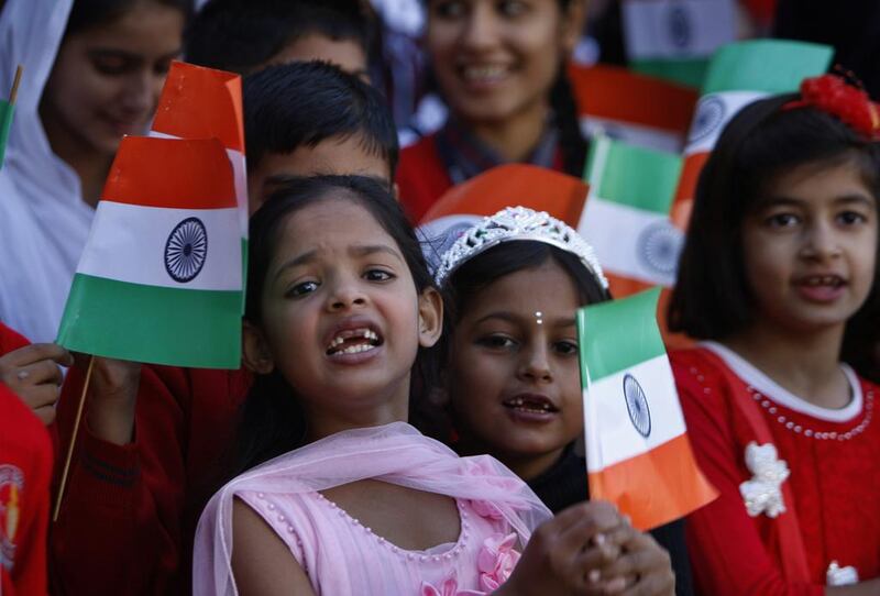Children cheering for Sachin in Jammu, India. Channi Anand / AP