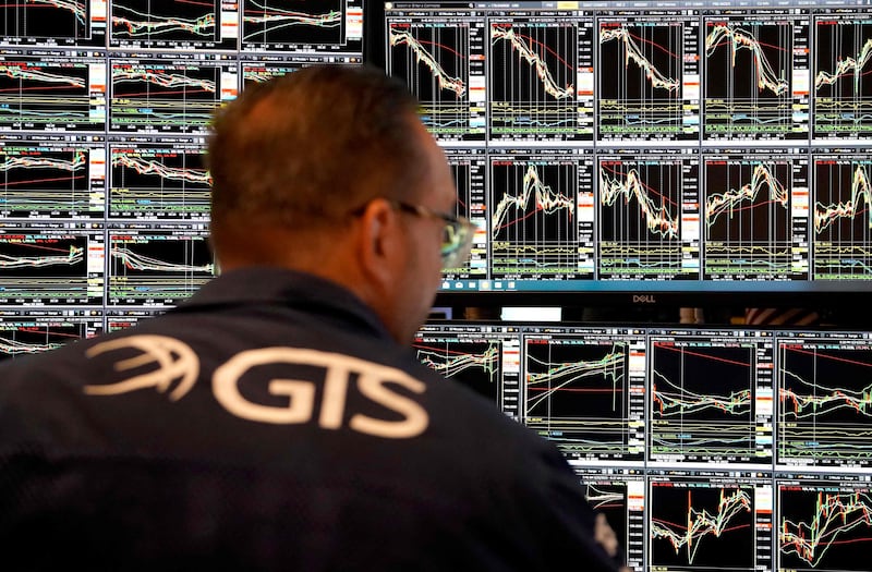 A trader on the floor of the New York Stock Exchange on May 25. AFP