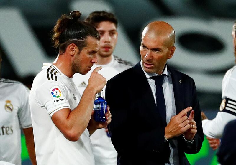 Real Madrid's Gareth Bale with coach Zinedine Zidane. Reuters