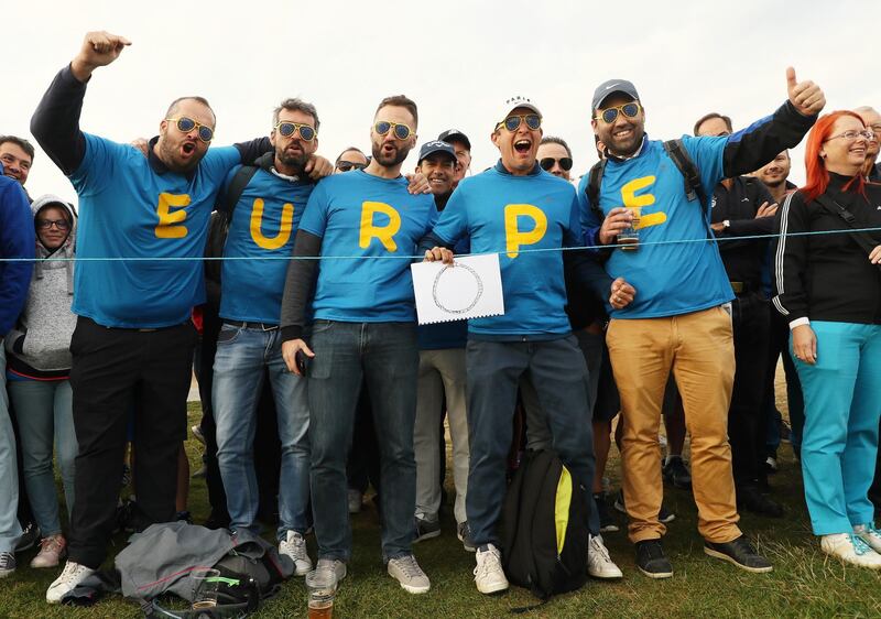 Fans of Europe during the morning fourball matches at the Le Golf National course. Getty Images