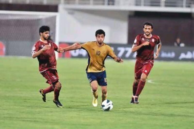 Hassan Abdelrahman, centre, and his Dubai teammates will be hoping for the kind of result the previous time they faced Al Wahda - a 2-1 Pro League win.