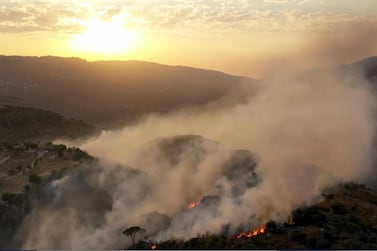 Smoke rises from a forest fire in Ras El Harf village in Lebanon's Baabda district on October 9, 2020. AP Photo