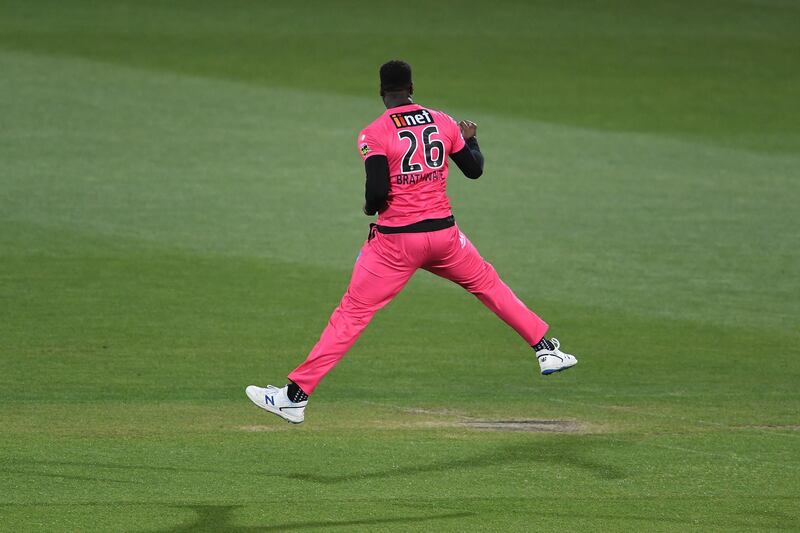 Carlos Brathwaite of the Sixers celebrates the wicket of Alex Carey of the Strikers during the Big Bash League match between the Sydney Sixers and the Adelaide Strikers at Blundstone Arena, in Hobart, Australia. Getty Images
