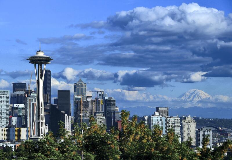 SEATTLE, WA - JUNE 8:  A general view of the Seattle Space Needle and downtown skyline with Mount Rainier in the background leading up to the 2019 Rock'n'Roll Seattle Marathon and 1/2 Marathon on June 8, 2019 in Seattle, Washington. (Photo by Donald Miralle/Getty Images for Rock'n'Roll Marathon )